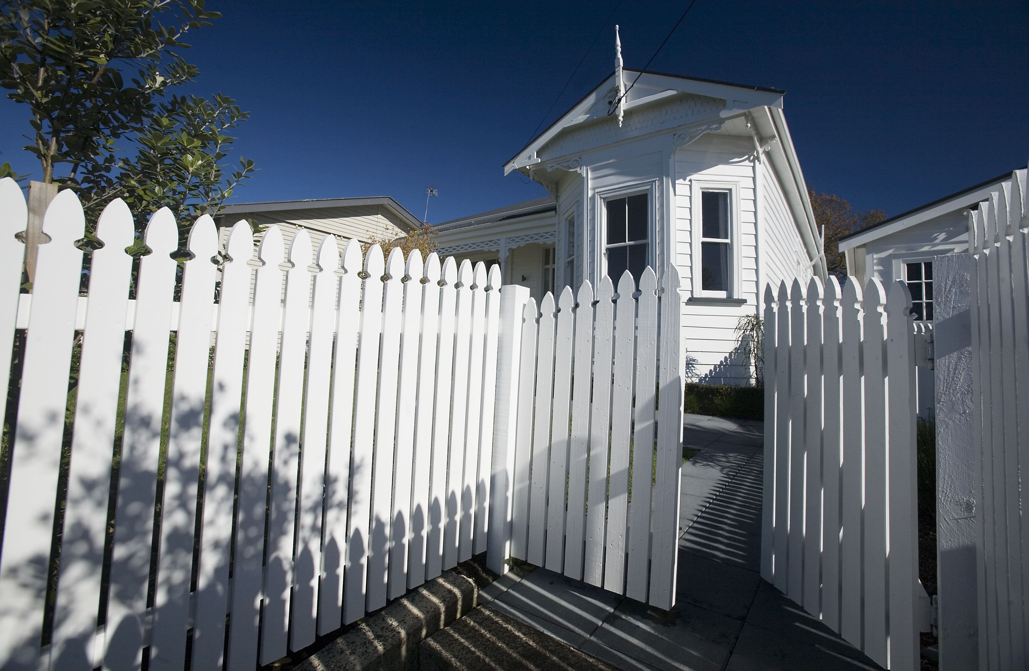 Villa behind fence