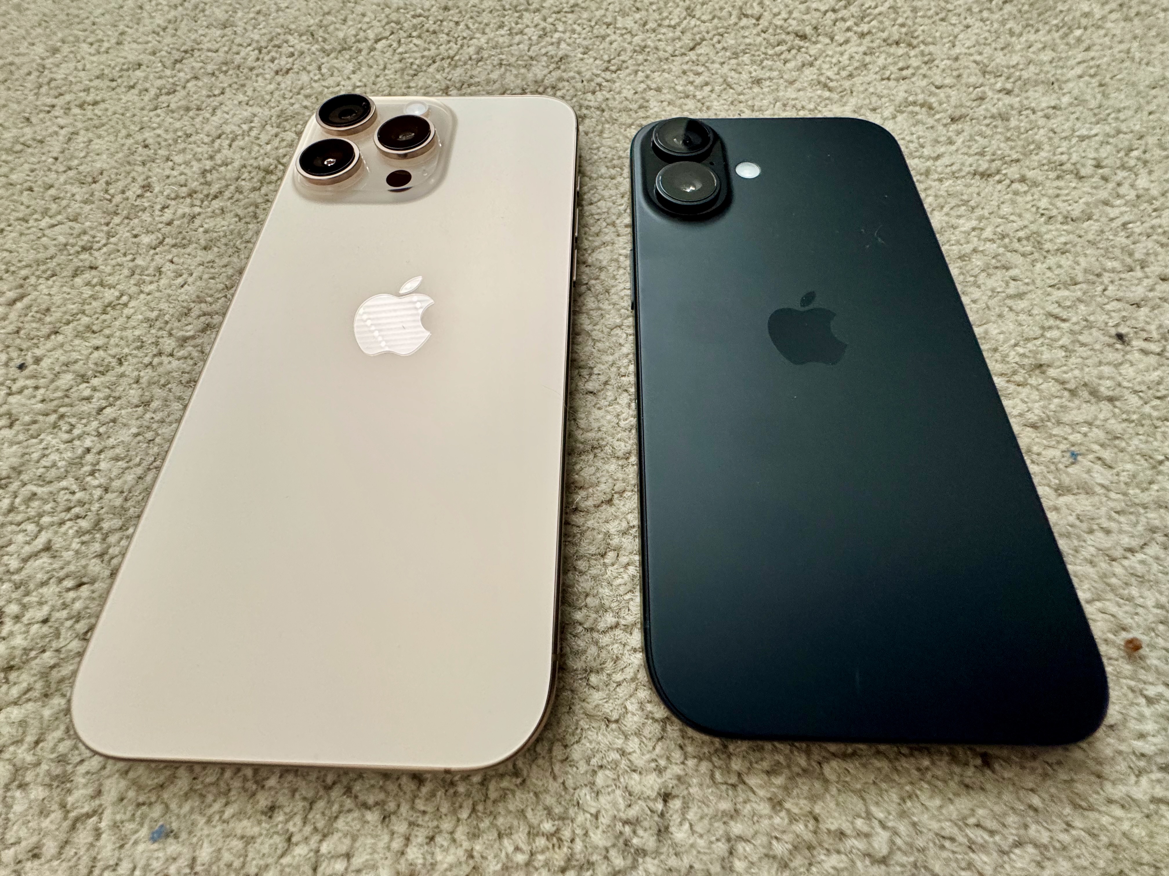 Apple iPhone 16 Pro Max next to the iPhone 16