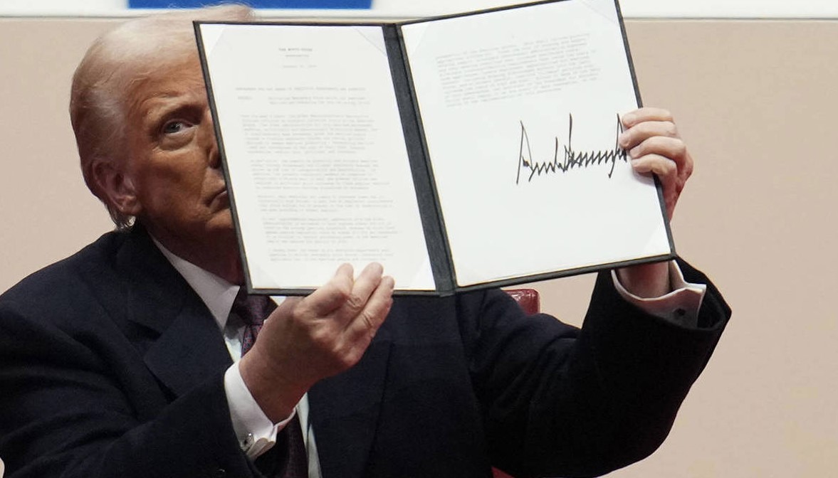 Trump showing off an executive order