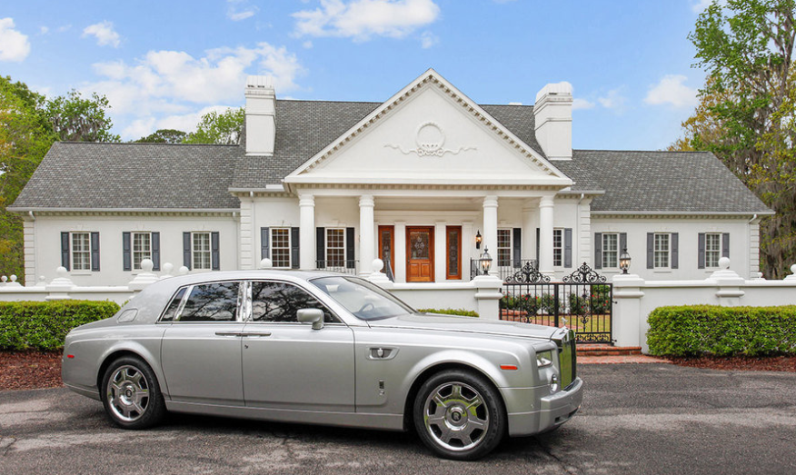 House with Rolls Royce 