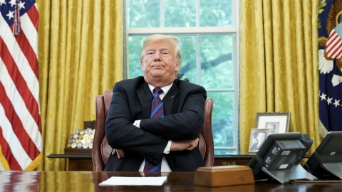 Trump with folded arms